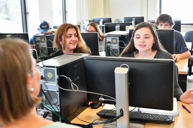 students and faculty in computer lab